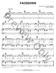 Facedown piano sheet music cover